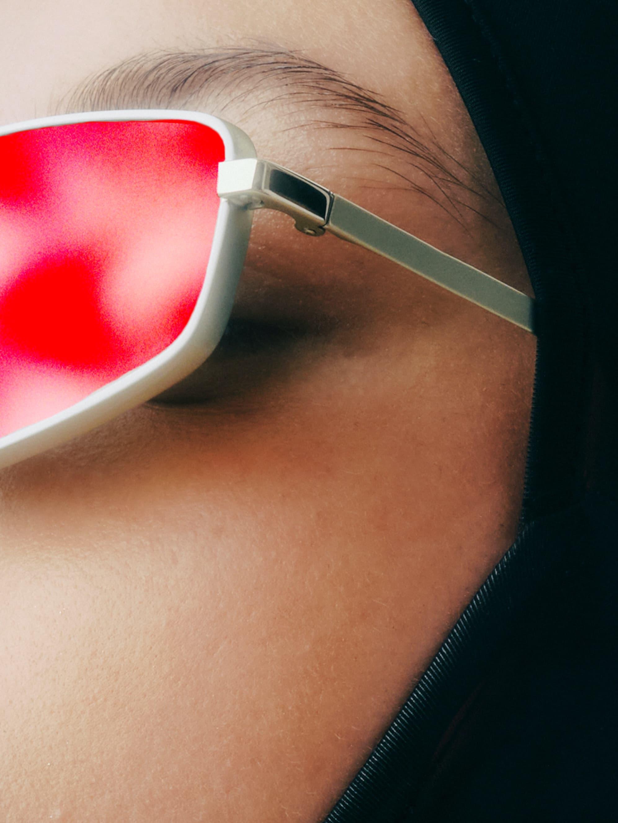 Face with red sunglasses